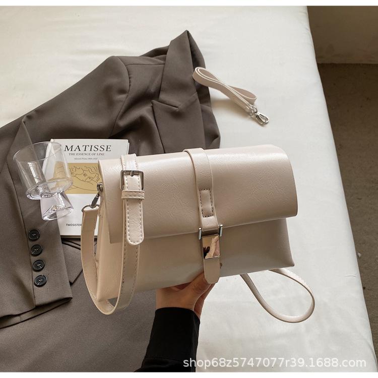 Retro casual commuter bag women's simple and versatile bucket bag 2025 spring niche fashion one-shoulder underarm bag