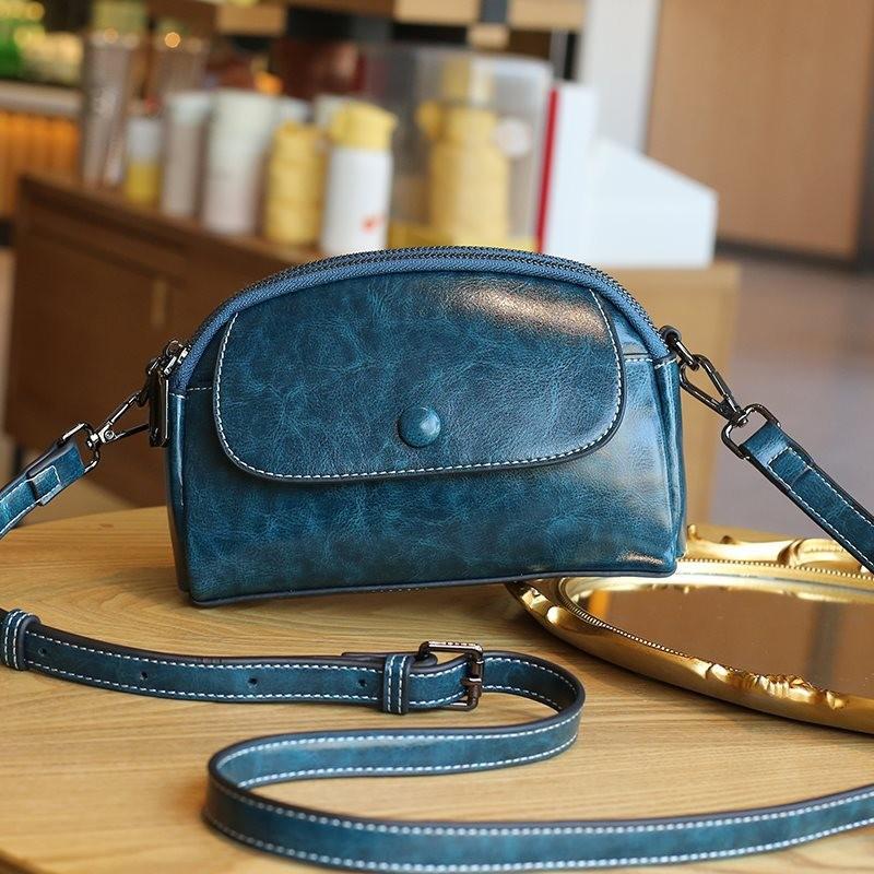 

Stylish Brown Soft Leather Small Crossbody Bag For Women With Mobile Phone Compartment Peacock Blue