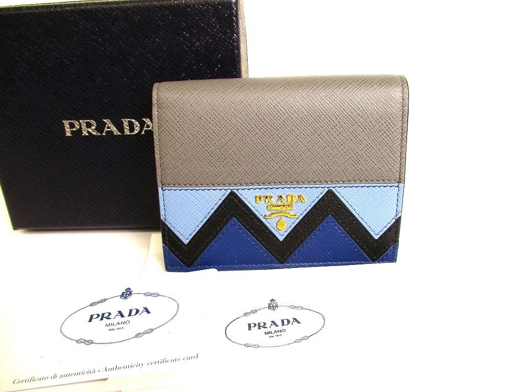 

Автентичний шкіряний гаманець PRADA Saffiano Grey Blue Multicolor, Compact Wallet #9518 Refurbished