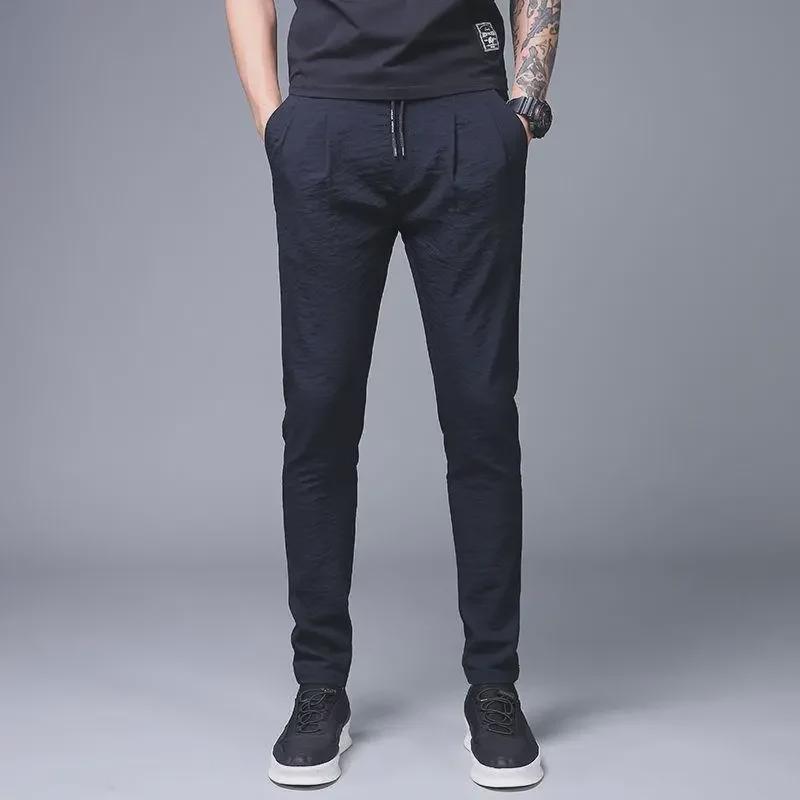 2023 Men's Loose Ice Silk Pants: Lightweight Korean-Style Trendy Summer Casual Straight Nine-Point Trousers.
