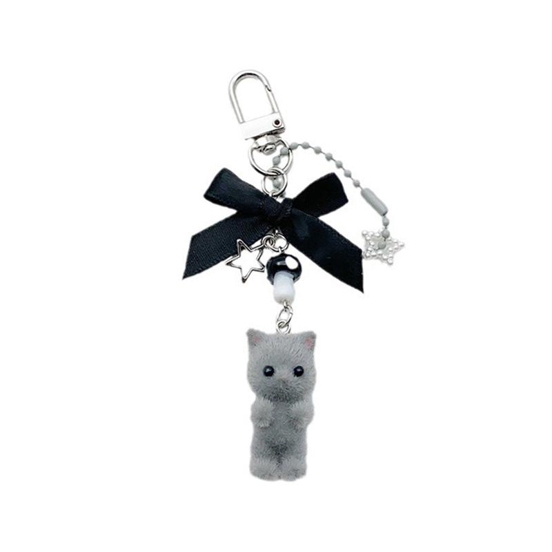 Uroczy Flokowany Kotek z Kokardką i Koralikami Breloczek Łańcuszek do Telefonu Komórkowego Łańcuszek do Słuchawek Torba Aparat Dekoracja Wisiorek Prezent