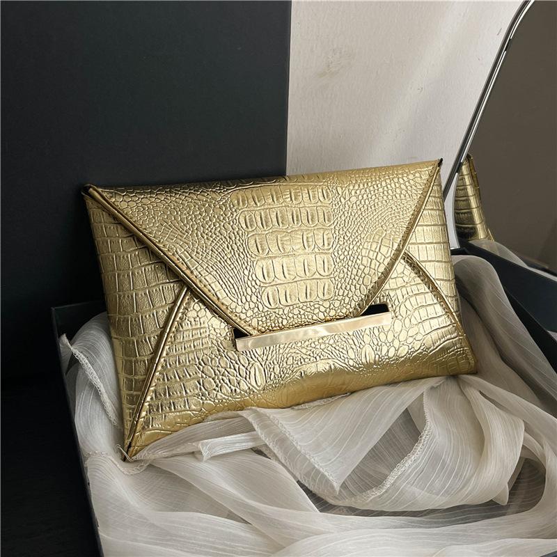 

Fashion bag 2025 autumn new simple clutch envelope bag new handbag temperament shoulder simple clutch bag золотий