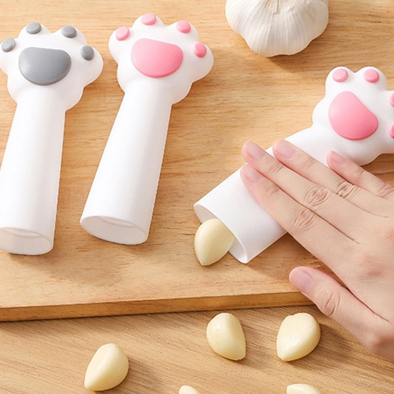 Outil Rapide Éplucheur d'Ail Avec Forme Griffe de Chat Rouleau à Éplucher Polyvalent Pour Noix Cacahuète Gadget de Cuisine