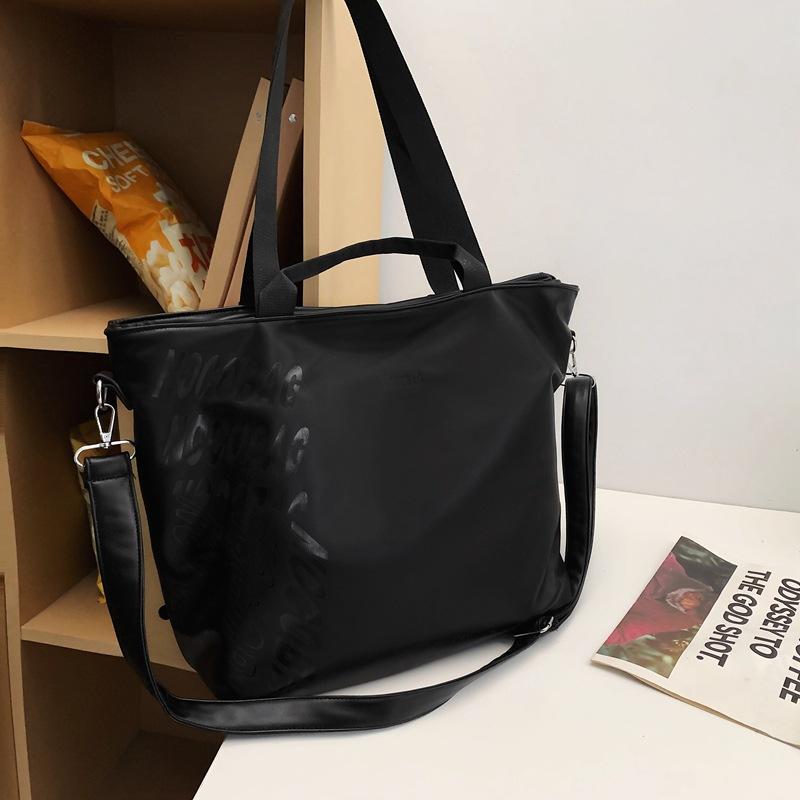 

Shoulder bag urban simple men s and women s commuting large-capacity portable oblique span shopping bag batch чорний