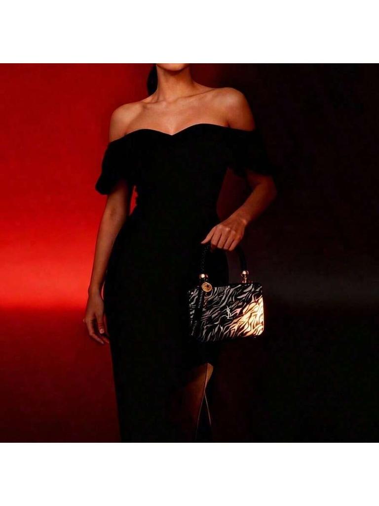 YSL Kadın Siyah Beyaz Zebra Desenli Portföy Çanta - Günlük işe gidiş ve alışveriş için uygun, çok fonksiyonlu bir makyaj çantası.