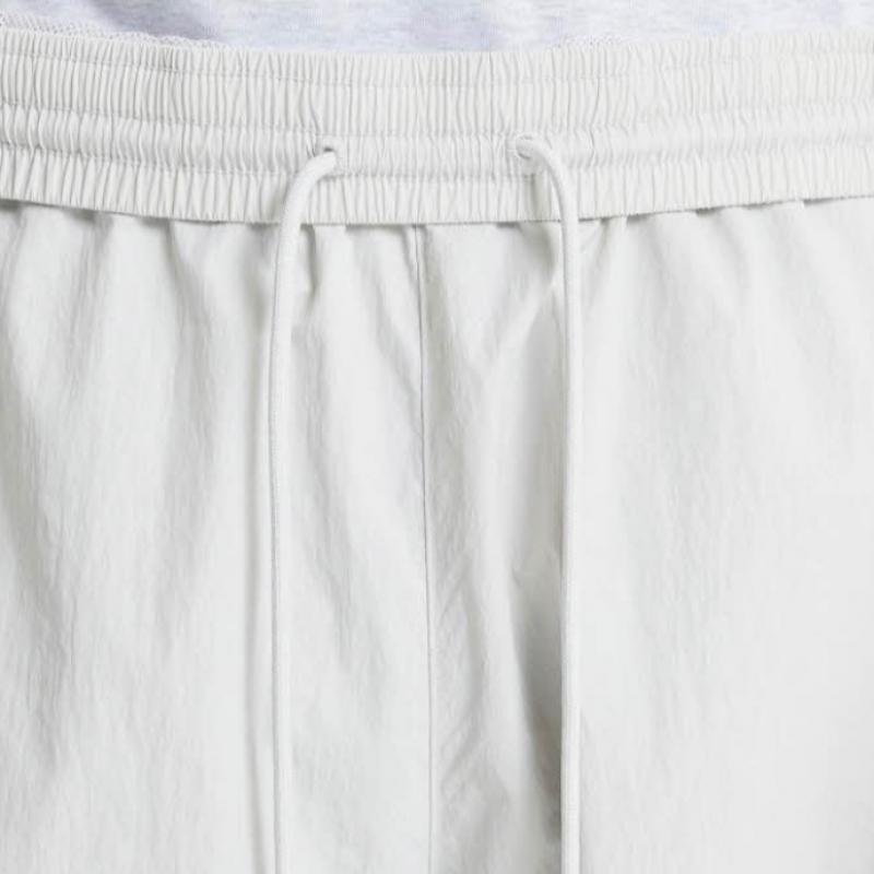 New Balance Pants Lqj Nbnte12313 16 Common Flying 2 Way Warm Up Pants