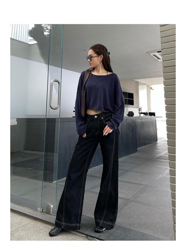 Damspecifika Högmidjade Retro Jeans med Kontraststygn och Vida Ben
