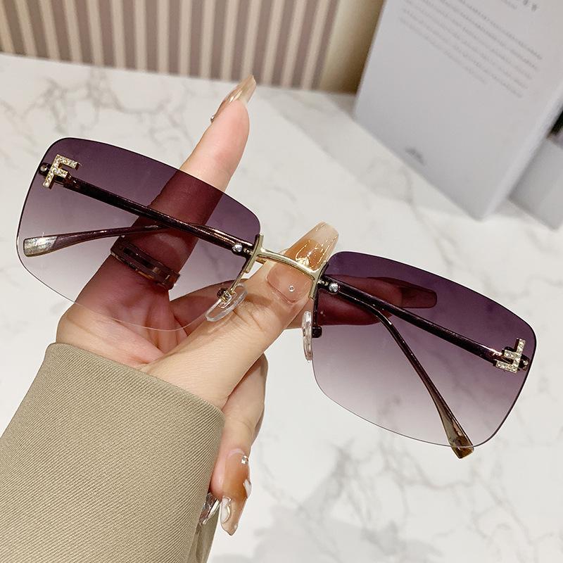 Ruiao rimless sunglasses UV400 fashion square metal glasses for women luxury brand designer diamond y2k small face sun glasses
