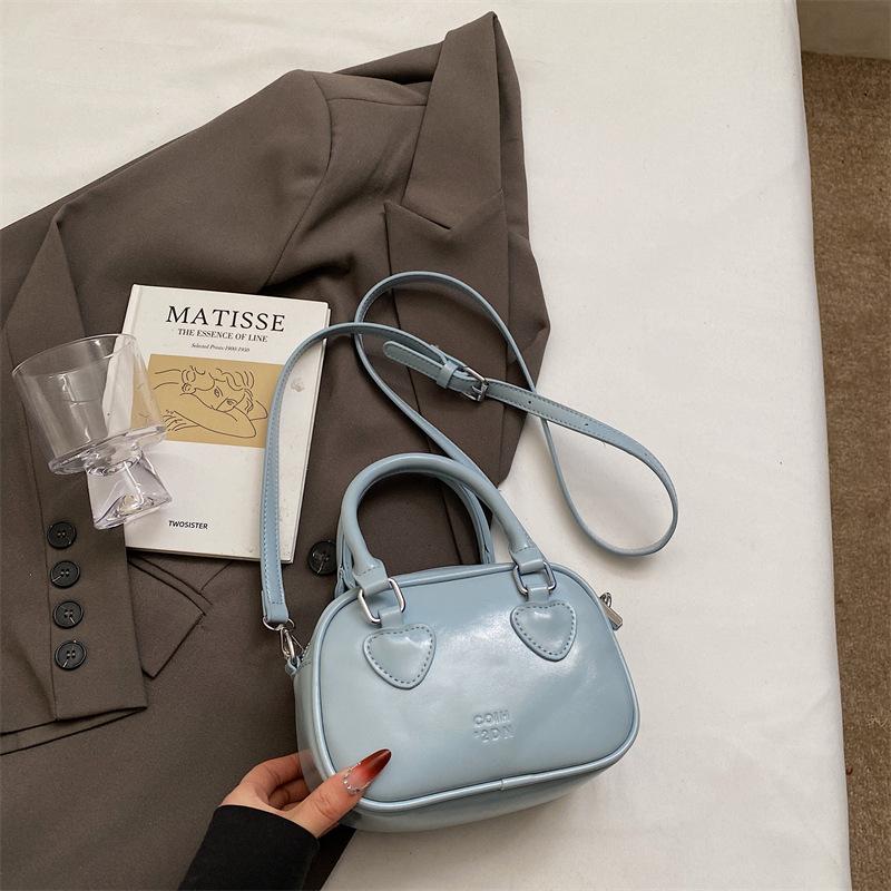 Summer popular small bag women's new fashion versatile messenger bag high-end portable bowling bag