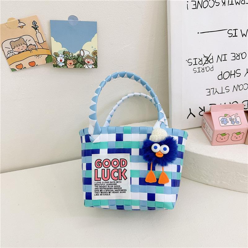 

Cartoon woven children s bag little girl hand carrying vegetable basket small bag Internet celebrity contrasting color beach bag woven basket