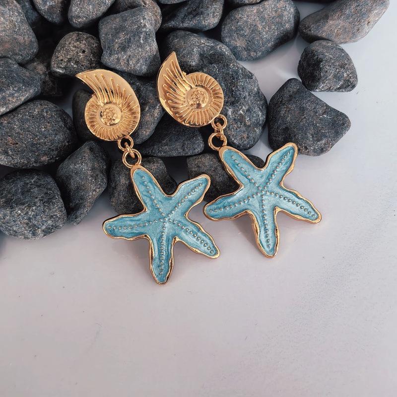 

Fashionable Gold Metal Starfish Tassel Earrings with Enamel Five-Pointed Stars озеро синього кольору