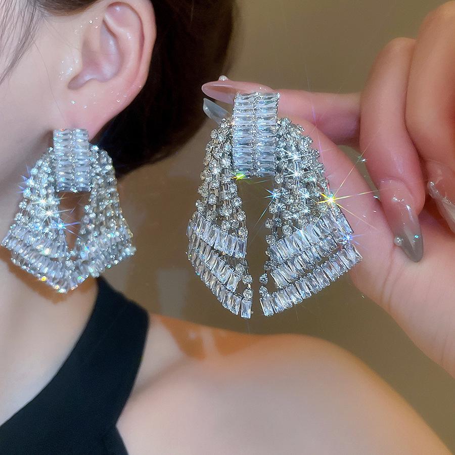 Silver Needle Water Drop Tassel Earrings - Light Luxury High-End Design for Women's Fashion.