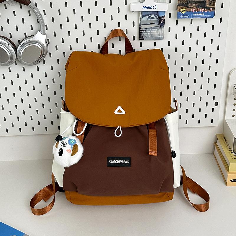 

Lightweight backpack contrasting color large-capacity schoolbag female new middle and high school students leisure outdoor travel commuter backpack single bag (without pendant) коричневый