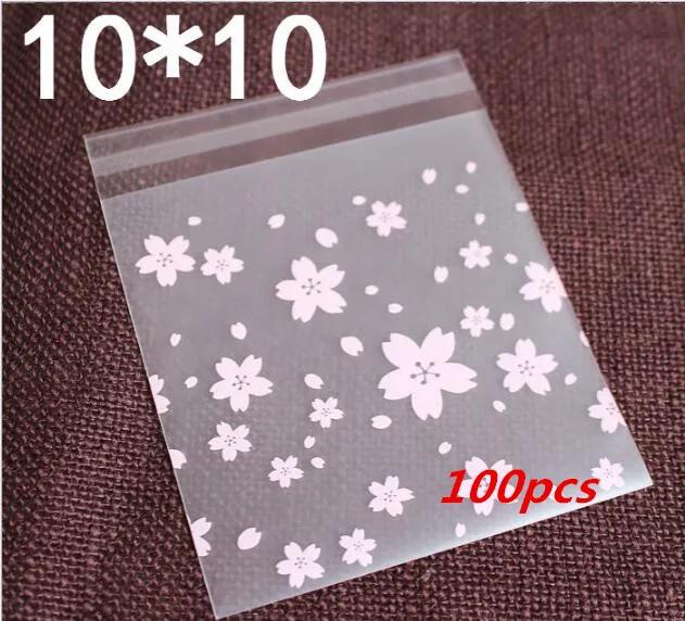 

100 шт. Розовые прозрачные мини-самоклеящиеся пакеты Opp с изображением цветущей вишни, сделай сам, пакеты для конфет и тортов светло-желтого