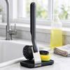Handheld Dish Brush with Press-to-Dispense Soap Delivery, Flexible Pad, Fiber Brush Attachment, and Standing Base for Kitchen Cleaning