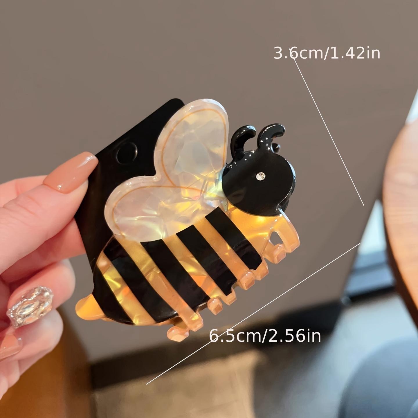 

A Charming Bee-Shaped Hair Clip Adorned with Rhinestones Featuring a Easy And Delightful Insect Design