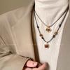 Autumn and winter Maillard tiger's eye stone beaded necklace femininity high-end sweater chain retro simple accessories