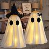 Svítící Halloweenská dekorace ducha Strašidelný svítící bílý látkový duch Strašidelná stolní ozdoba pro vnitřní domácí krbovou římsu