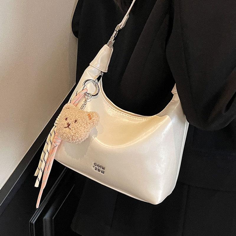 Korean version of fashionable simple high-quality textured wrist dumpling bag niche casual versatile commuter messenger crescent bag women