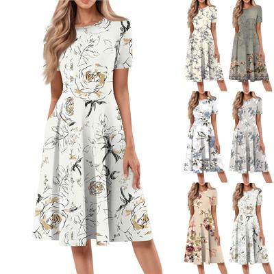 Kadınların Bol Günlük ve Şık Yuvarlak Yaka Kısa Kollu Baskılı Orta Uzunlukta Elbise