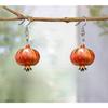 Cross-border new European and American Santa Claus earrings acrylic creative design sense Christmas Eve cute apple earrings