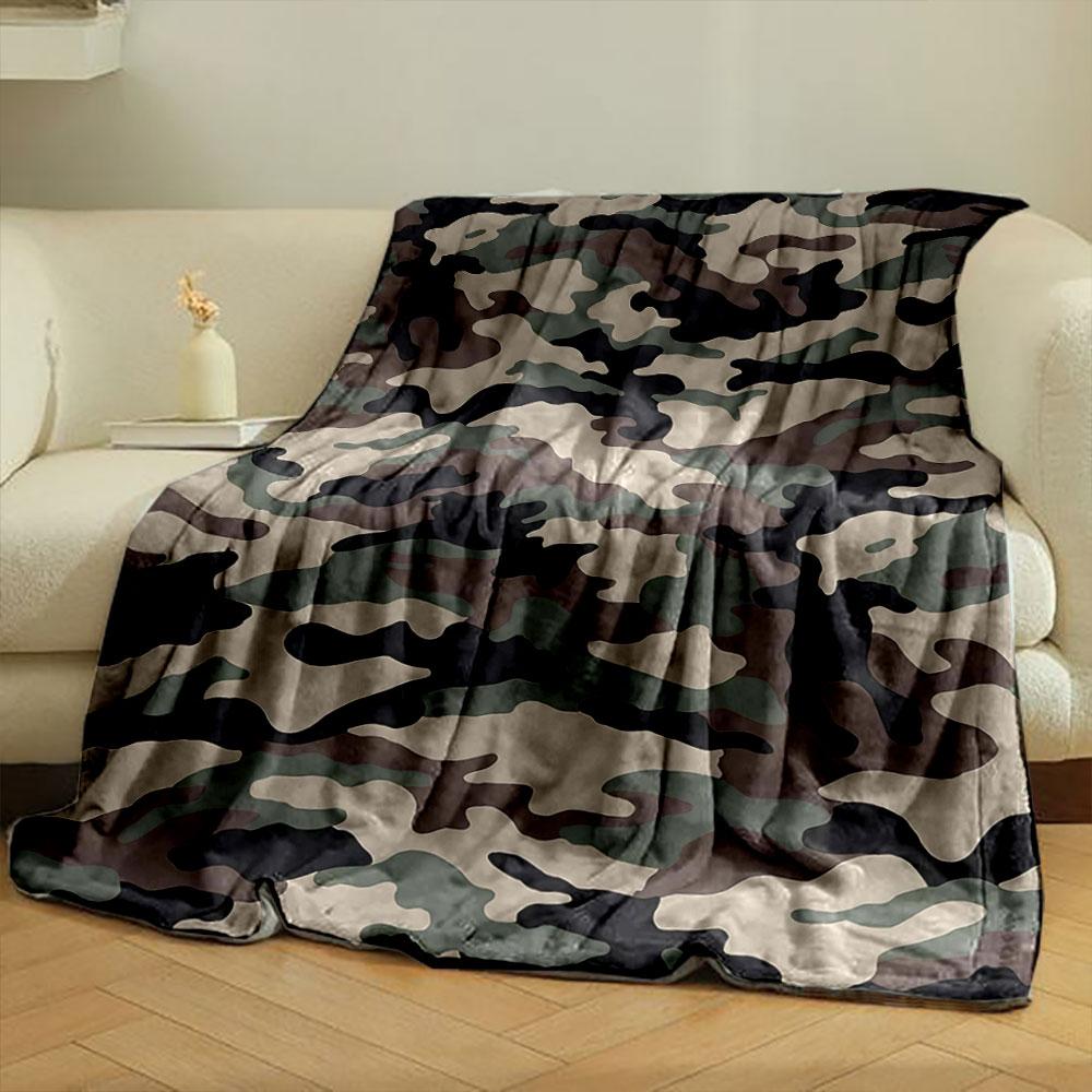 The image features a green, brown, black, and beige camouflage pattern. for all seasons blanket lunch break throw gift
