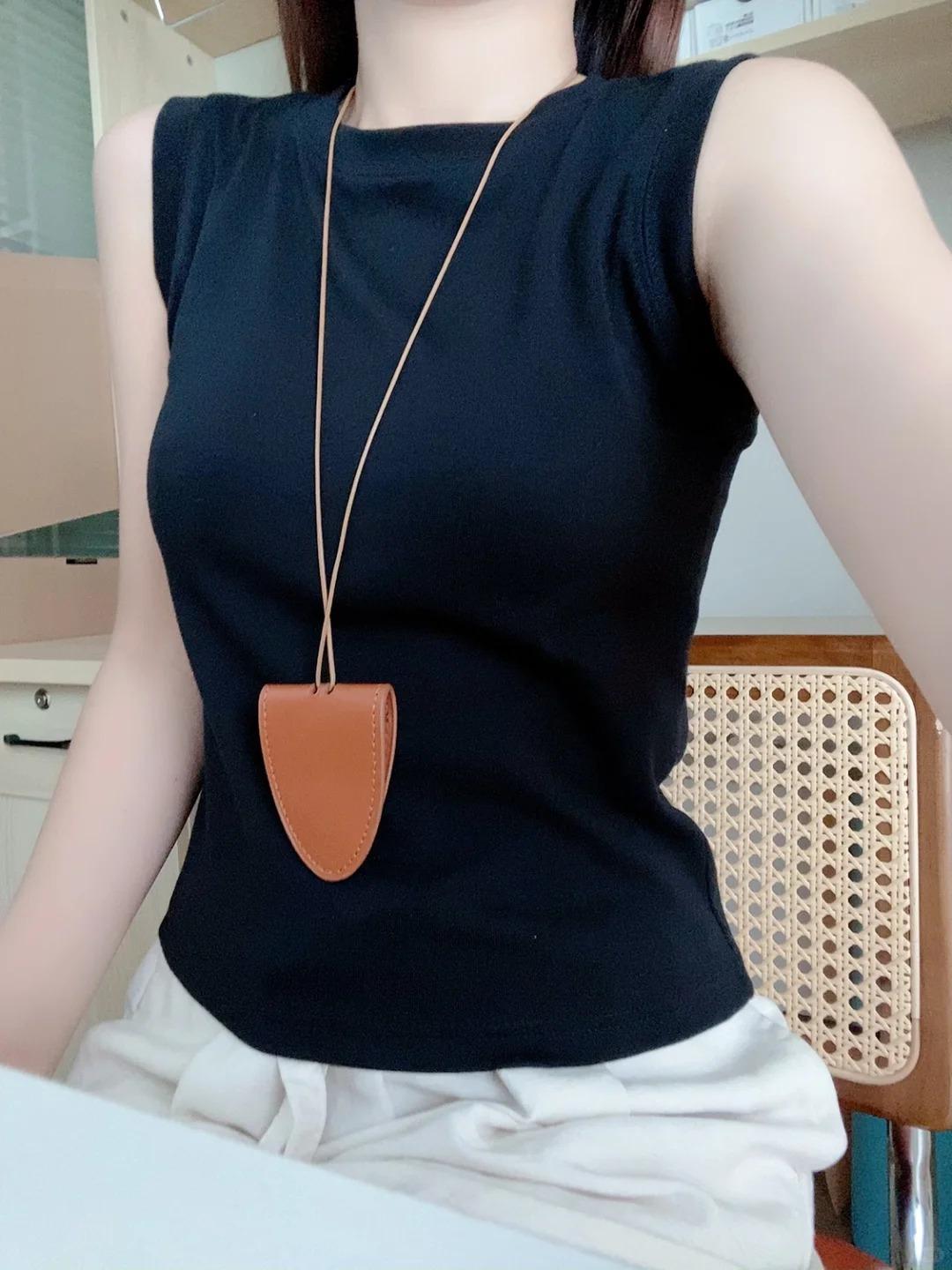 

Blue high-end versatile I-shaped vest for women, simple spring temperament, sleeveless inside, stacked with a bottomed top XL чорний