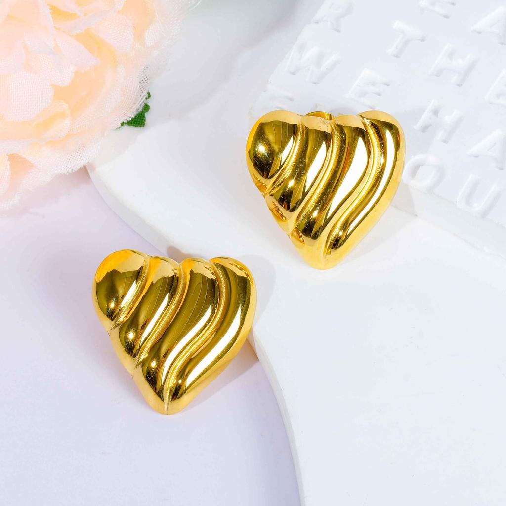 European-American Titanium Steel Gold Triangle Earrings: High-End, Unique, Stainless Steel Design.