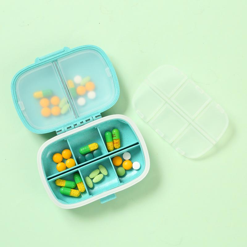 Moisture-proof 8-Compartment Pill Box: Portable Weekly Medicine Organizer.