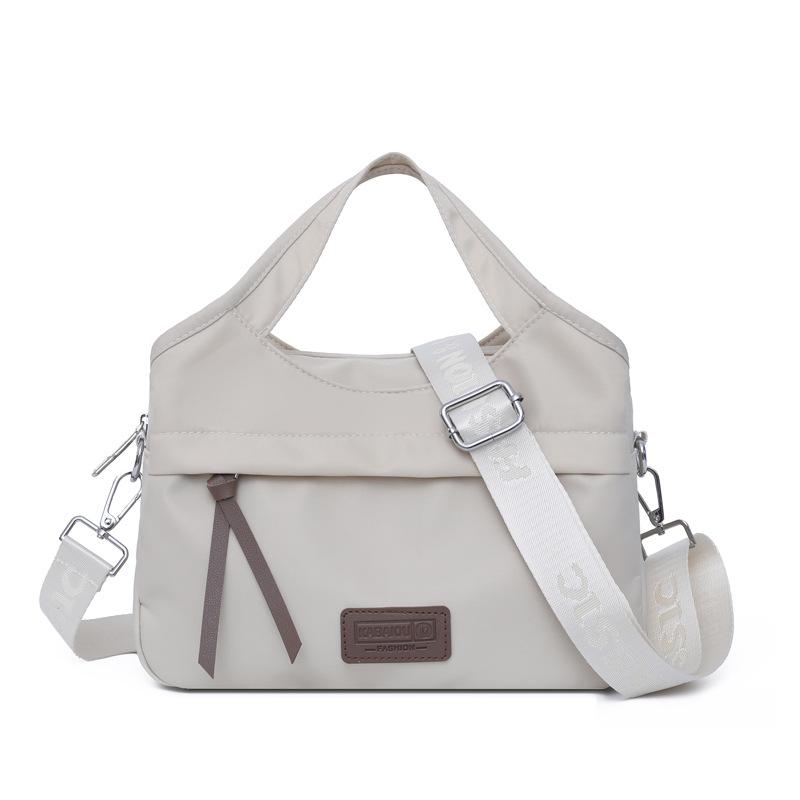 

Lightweight and large-capacity multi-layer handbag New simple and versatile casual shoulder bag Women s messenger bag