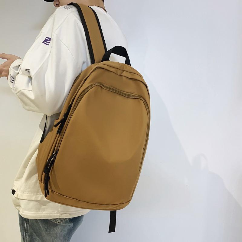 Spring new college style solid color student schoolbag Korean version large-capacity junior high school backpack