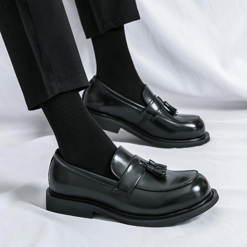 Black big head business casual leather shoes men's Korean version fringed platform loafers men's nightclub height-increasing small leather shoes