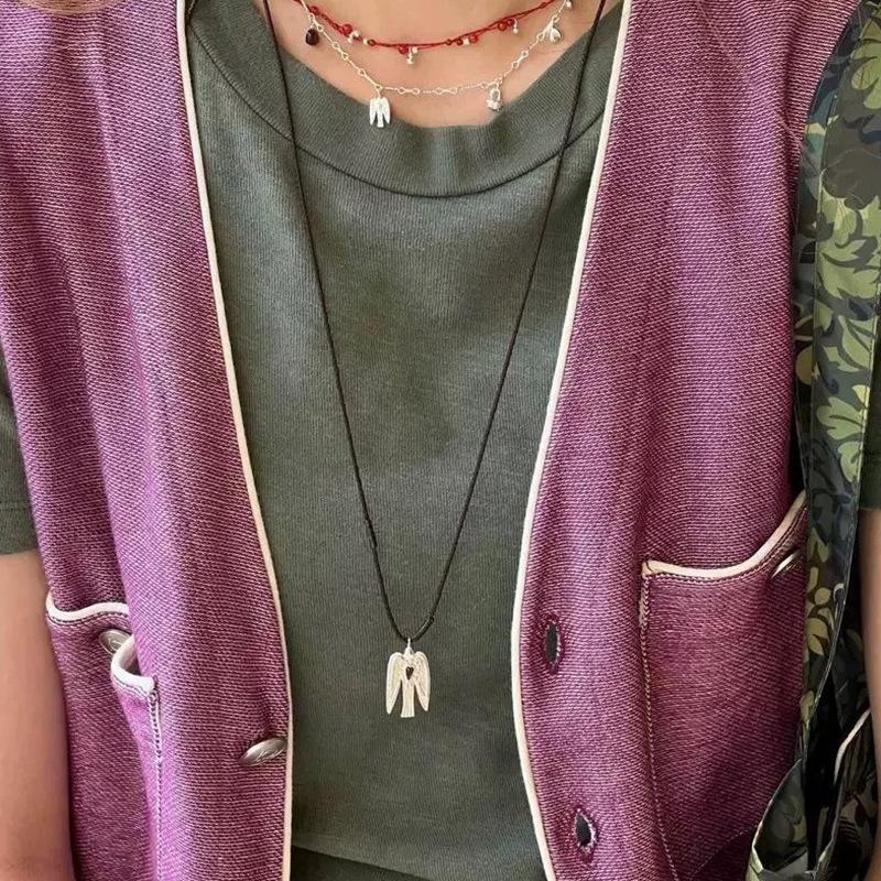 2026 New Arrival Long Adjustable Wax Rope Sweater Chain Chokers For Women Metallic Bird With Wings Pendant Necklaces