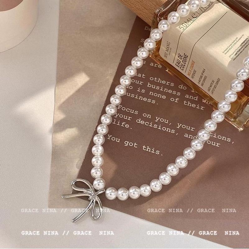 Light luxury bow pearl necklace women's niche simple design collarbone chain temperament versatile high-end jewelry
