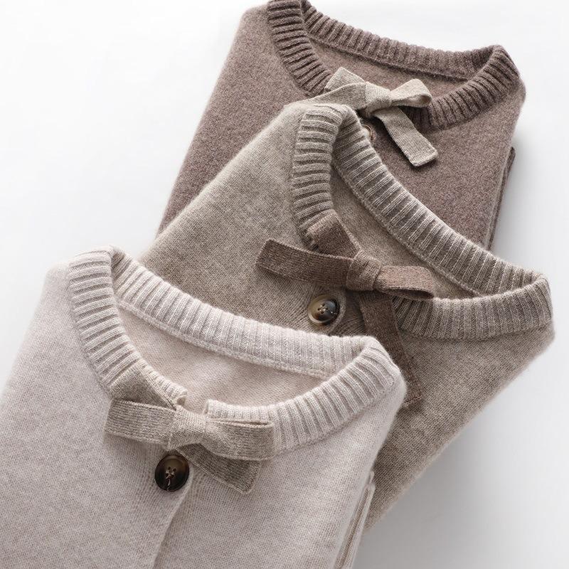 Autumn and winter new knitted cardigan women's single-breasted outer sweater loose round neck tether wool knitted sweater jacket tide