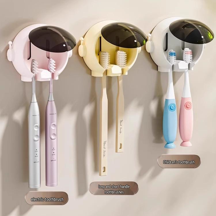 Bezprzewodowy, montowany na ścianie stojak do przechowywania elektrycznych szczoteczek do zębów i pasty do zębów z uchwytem na kubek do płukania ust.