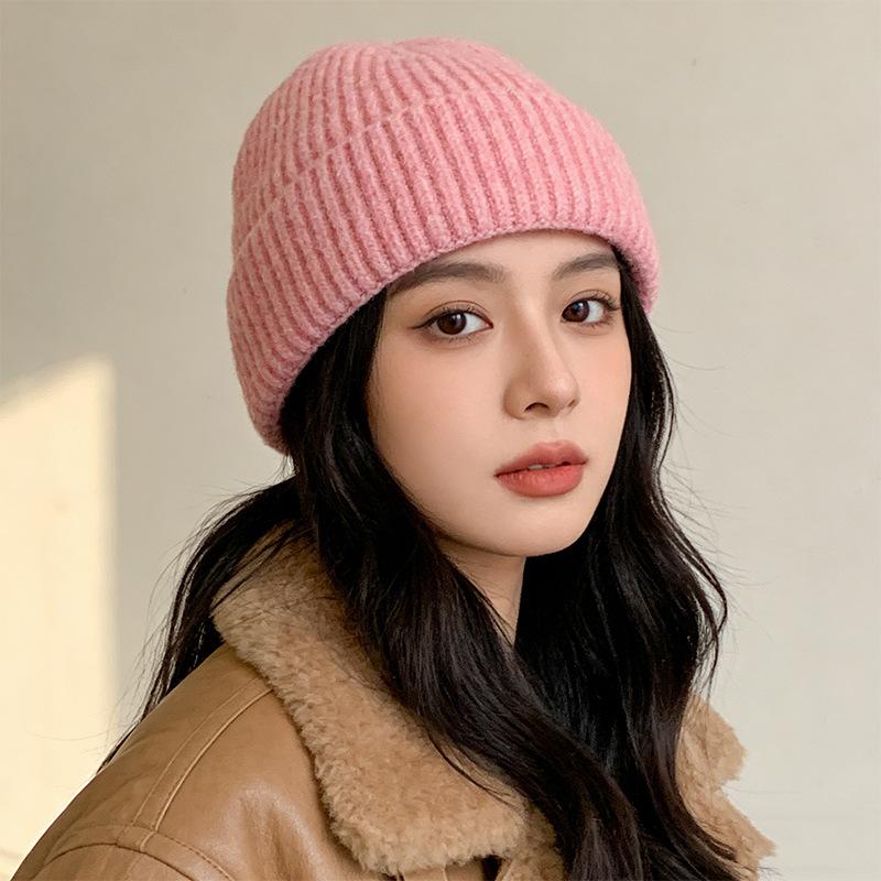 

Autumn and winter warm loose wool hat solid color simple versatile knitted hat men s cold hat M（56-58cm） розовый