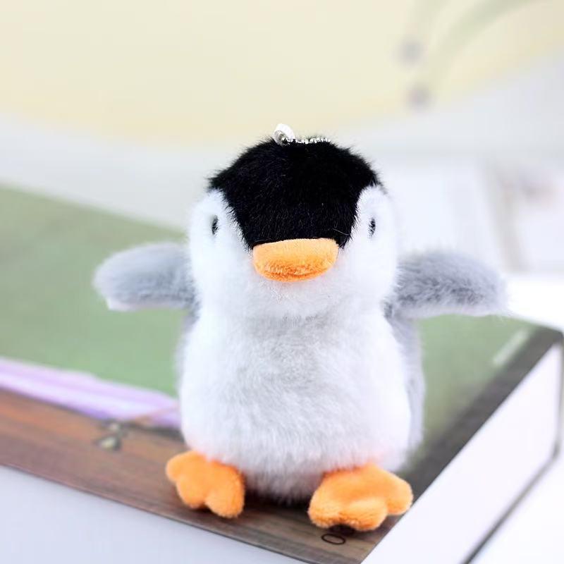Adorable Penguin Plush Keychain Charm - Companion Cartoon Claw Machine Figure and Bag Accessory.