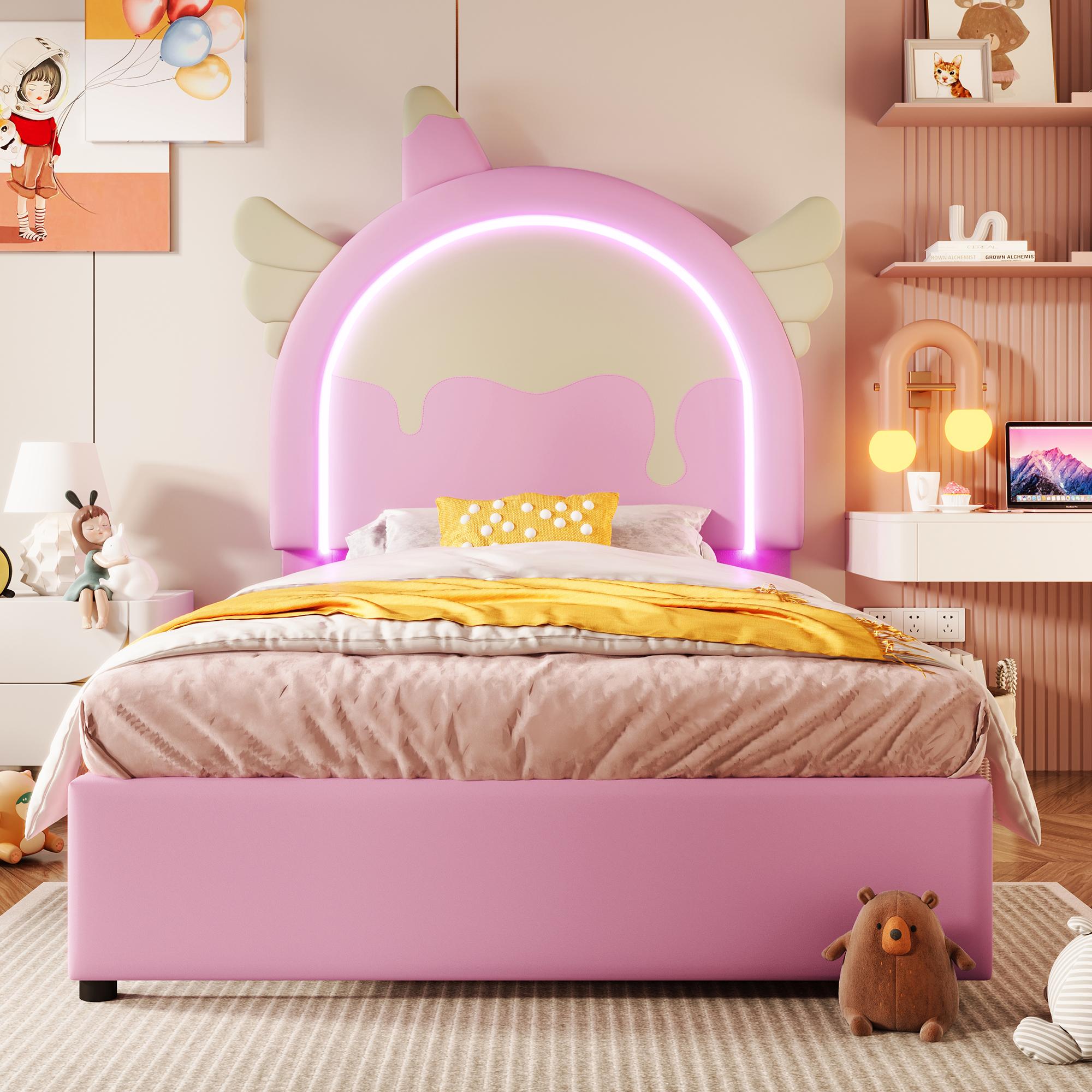 Pat de copii Flieks, pat tapițat 90x200 cm pentru fete cu tăblie în formă de unicorn, bandă LED 16 culori și 2 sertare, roz 203.5x105x137.5 cm roz