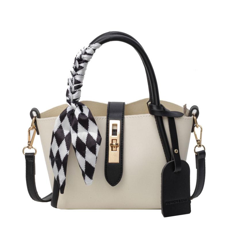 

Small texture and fresh bag women s new fashionable portable bucket bag contrasting color simple shoulder messenger bag tide