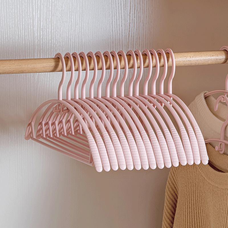 Japanese-Style Non-Slip Thickened Plastic Clothes Hanger for Dormitory, Balcony, or Wardrobe.