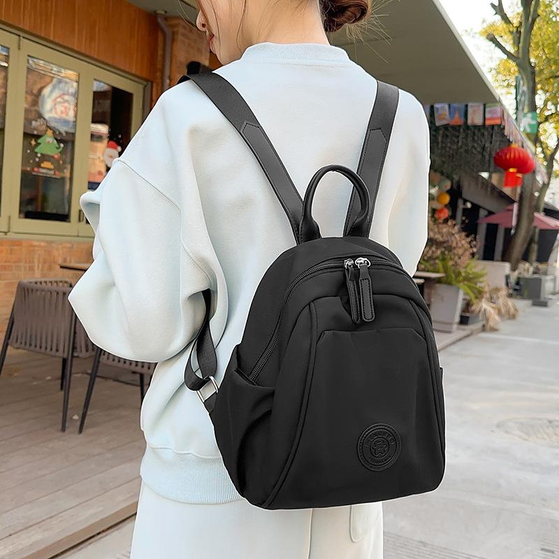 Backpack Women's New Simple Casual Large-capacity Travel Bag Lightweight Outdoor Travel Bag Student Small Backpack