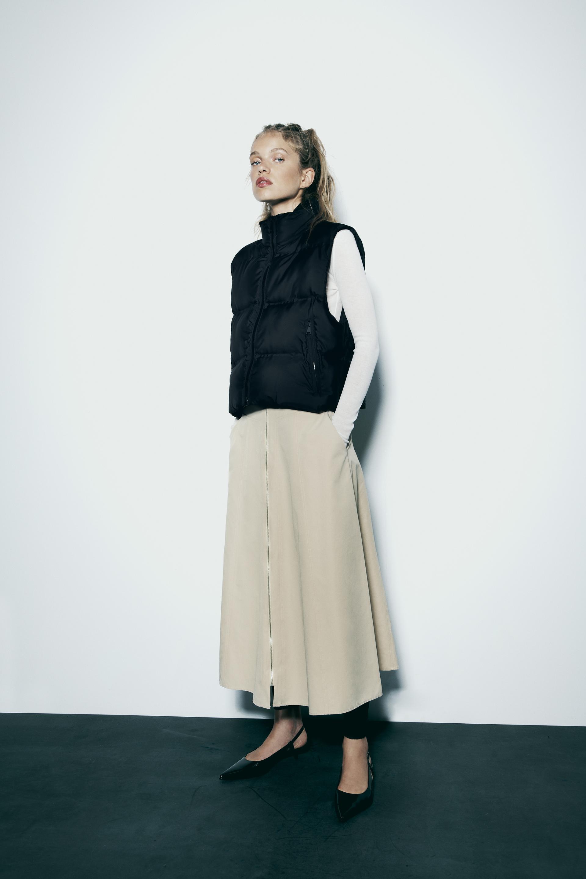 

Укороченный пуховый жилет с защитой от воды и ветра