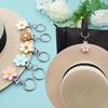 Porte-chapeau à clipser sur un sac, pour chapeau, mains libres, forme de fleur, léger, pour voyage