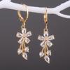 Cao Shi European & American Fashion Floral Earrings: Copper with Zircon Inlays