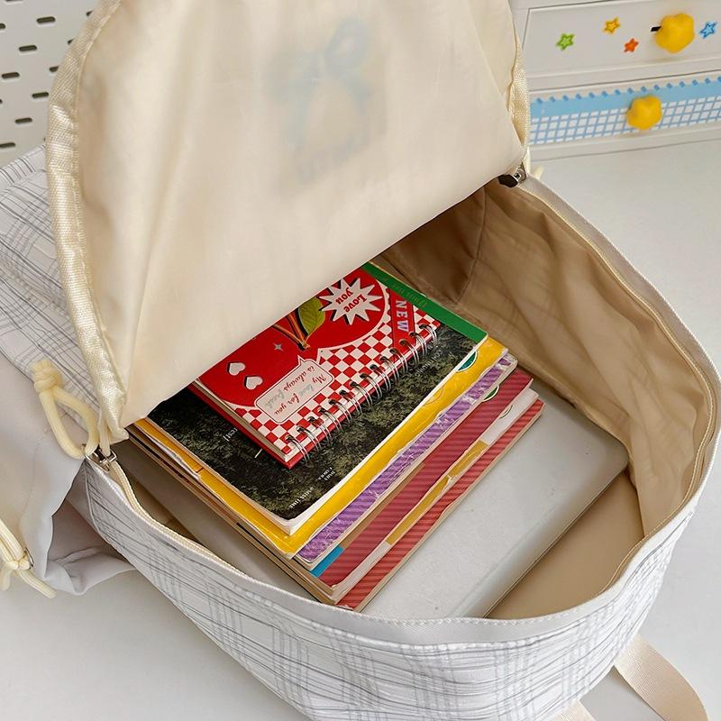 Schoolbag Japanese plaid college style high-value backpack girl campus style light and large-capacity junior and high school student schoolbag
