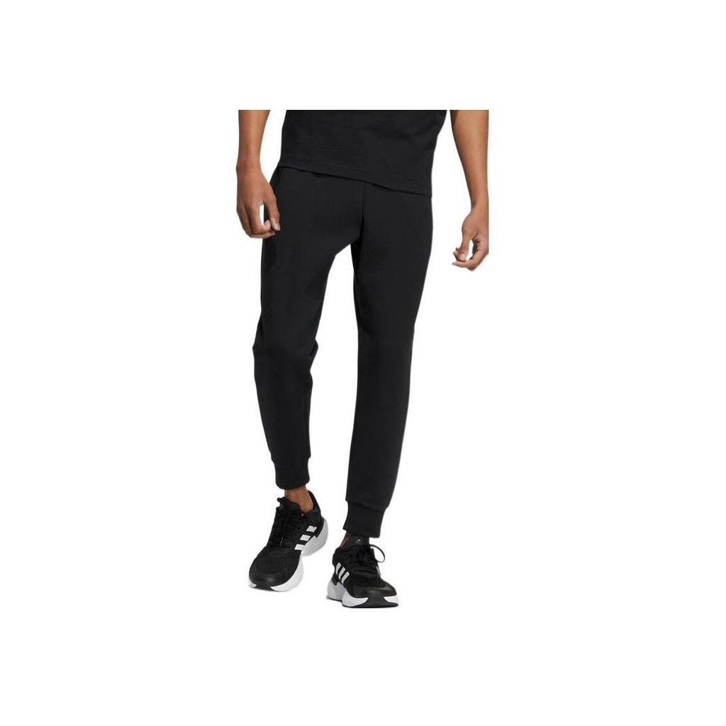 Adidas Pantaloni de jogging conici cu talie elastică de culoare pură Bărbați Jos Negru HN8962