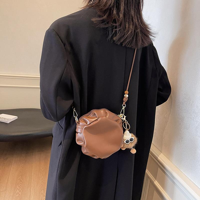 Niche cute girl pleated small round bag design sense small bag women 2025 new trendy shoulder messenger bag