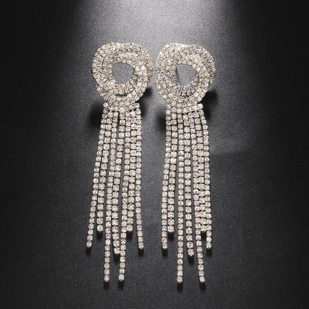 

Тяжелая работа, полная струящихся цветков, советские серьги. Длинные серьги-подвески со стразами. серебряный