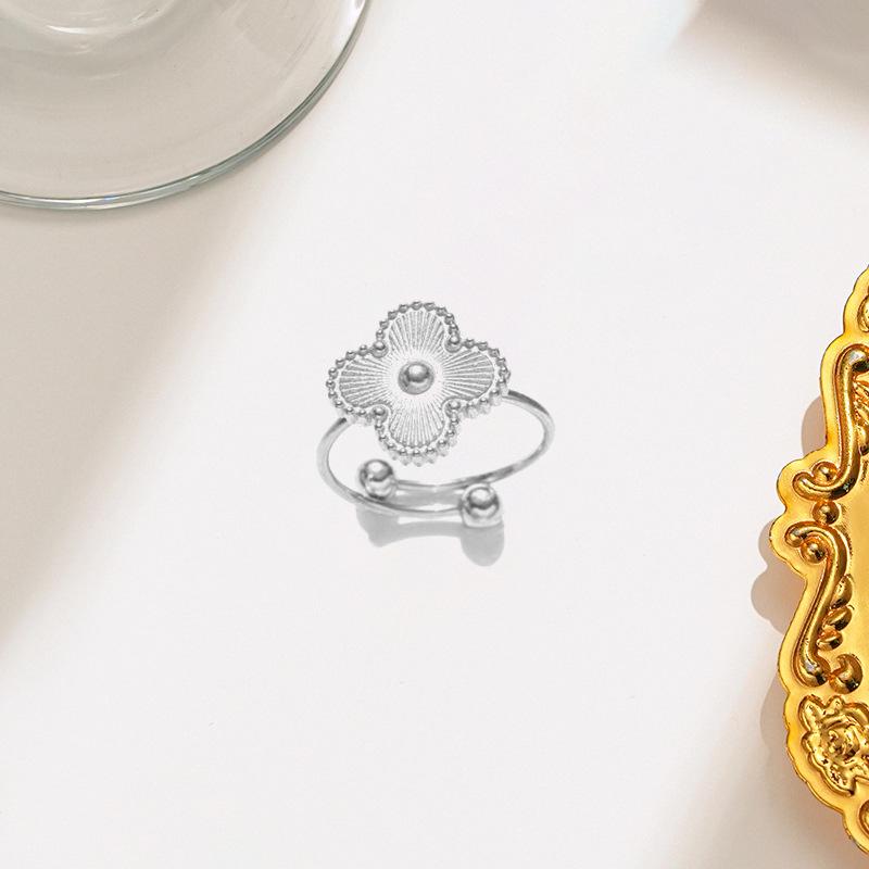 Elegant Four-Leaf Clover Necklace & Bracelet Set - Titanium Steel, Laser-Cut Design, Stylish for European & American Fashion.